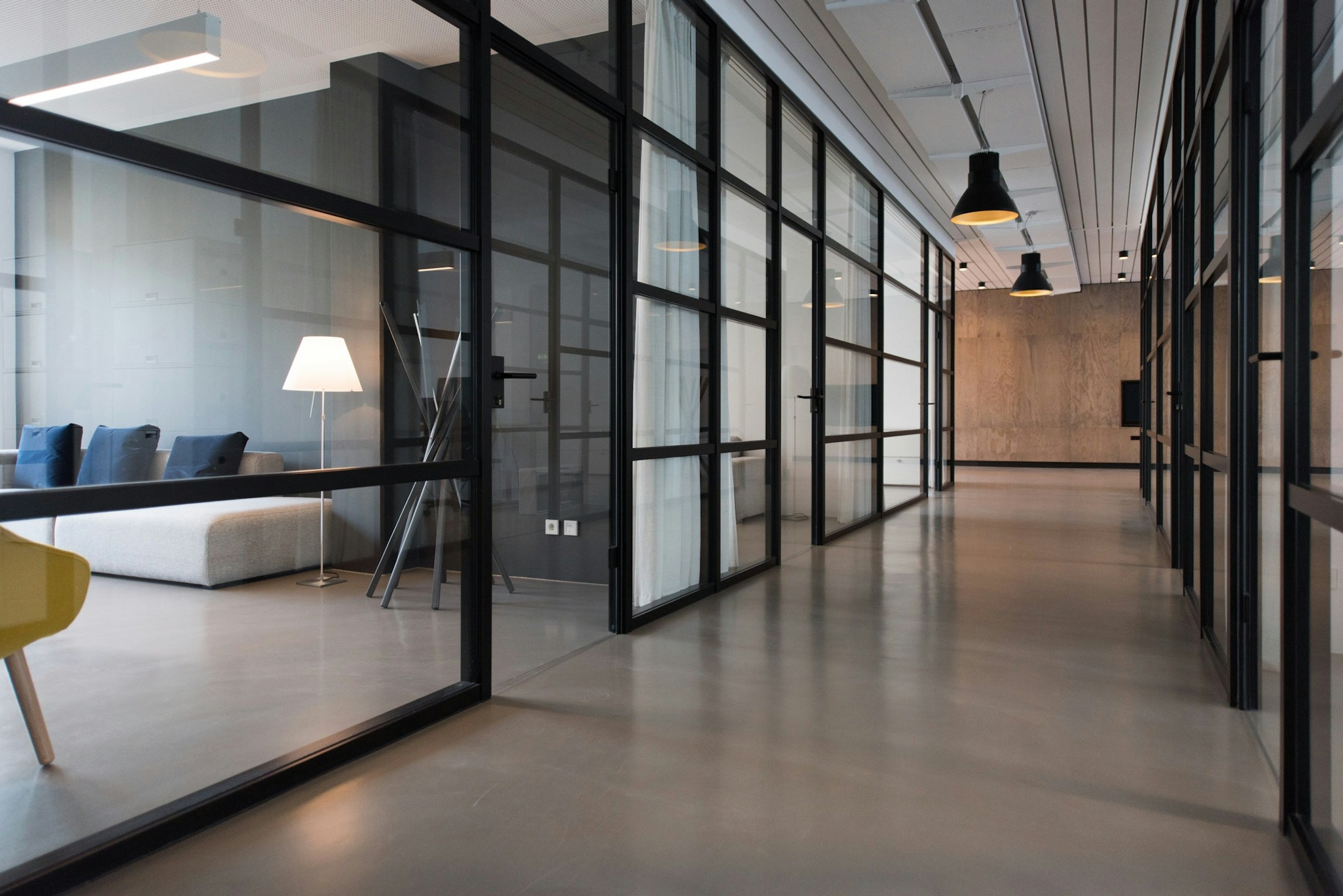 Modern commercial interior with glass partitions